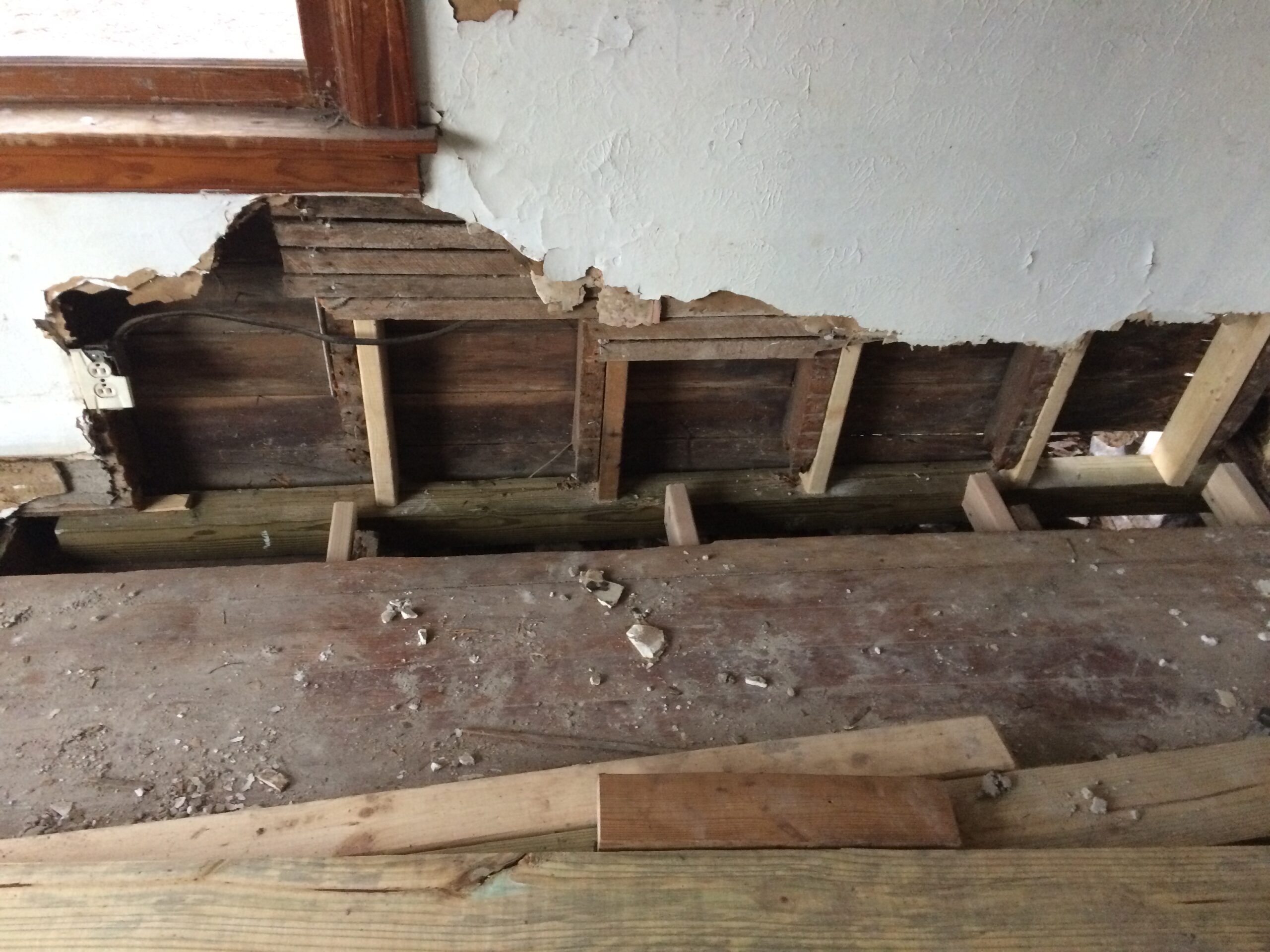 more termite damage on a home walls and sill